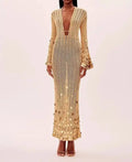 Midnight Shimmer Maxi dress displayed on a hanger, showcasing its luxurious lightweight fabric.