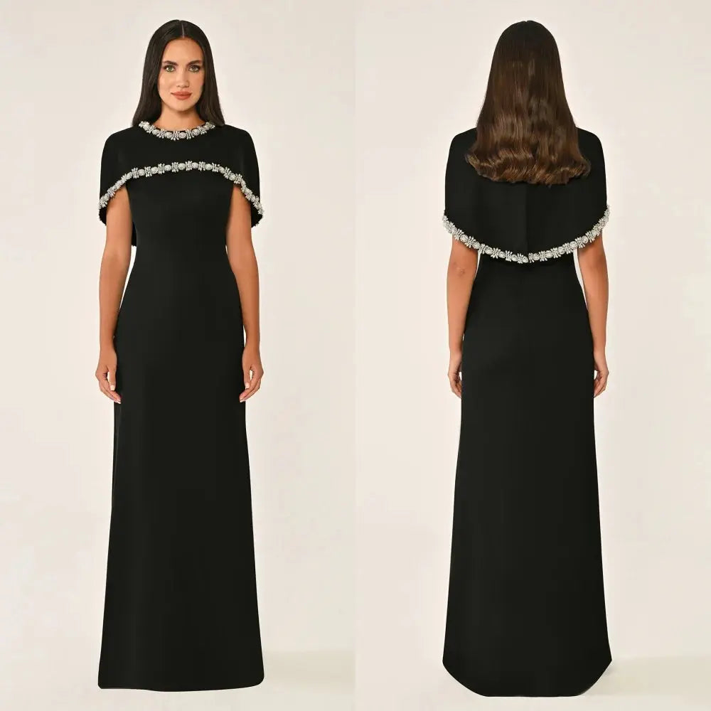 Midnight Shimmer gown in deep navy with sequined details and A-line silhouette.