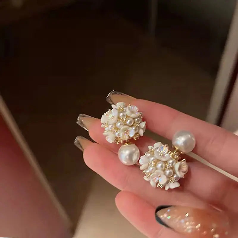 Close-up of Pearl Whispers Earrings showcasing timeless elegance and understated beauty.