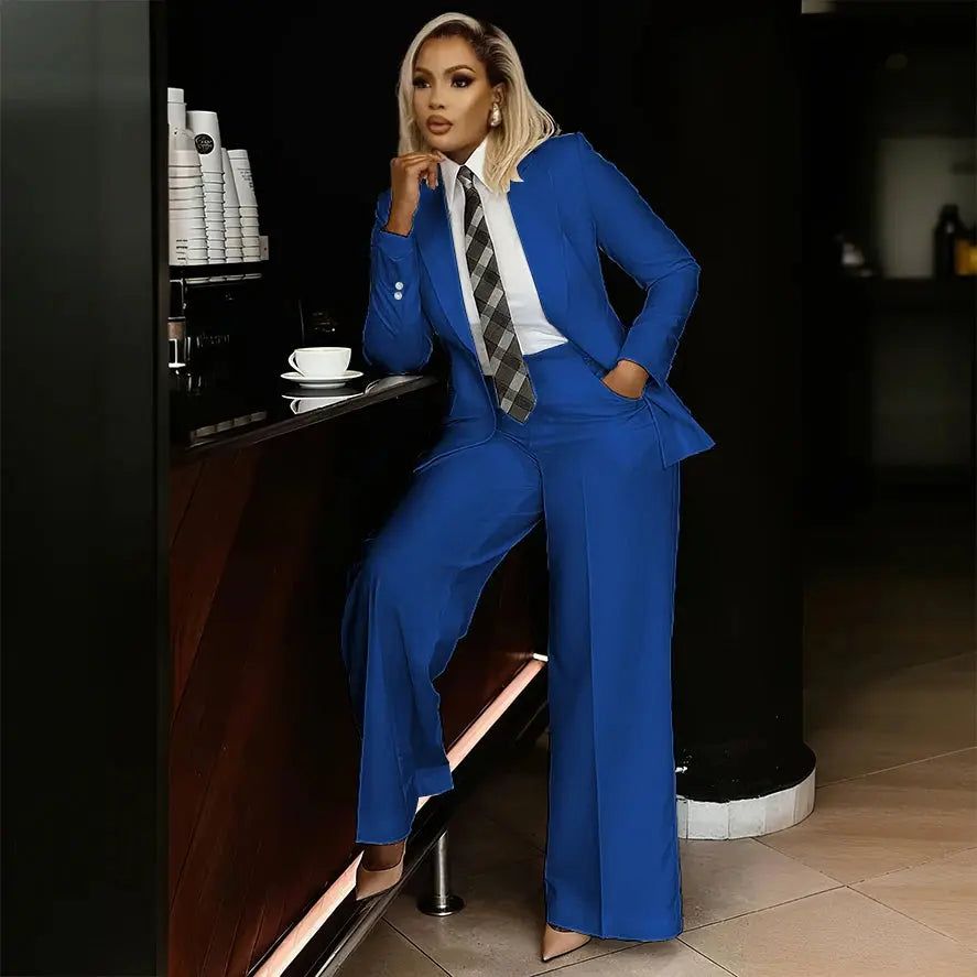 Chic white suit set paired with stylish heels for a polished look.