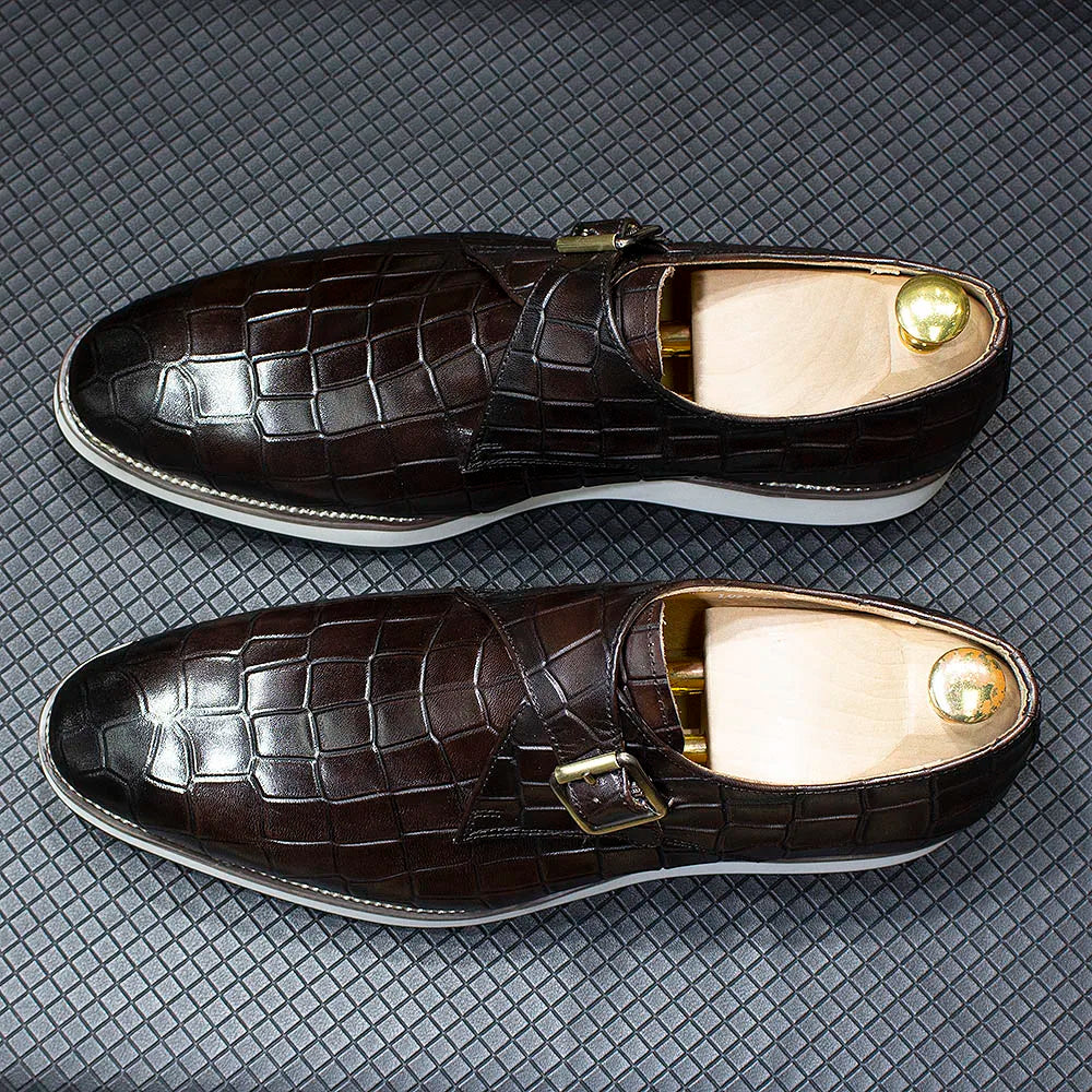 Dark brown monk strap shoes featuring exotic crocodile embossed leather and elegant hasp buckle design