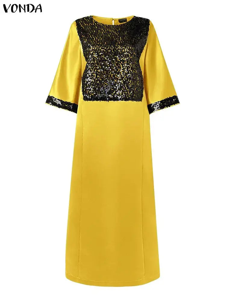 Model wearing the Midnight Whispers Sequin Maxi at a sophisticated soirée, exuding glamour.