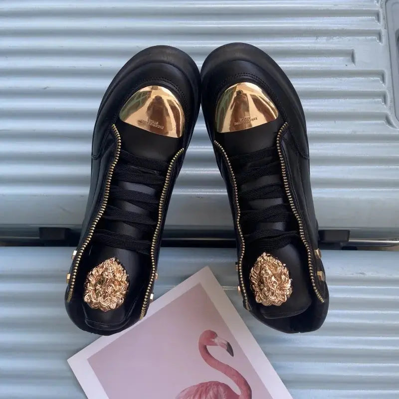 Durable black high-top sneakers showcasing robust rubber outsoles.
