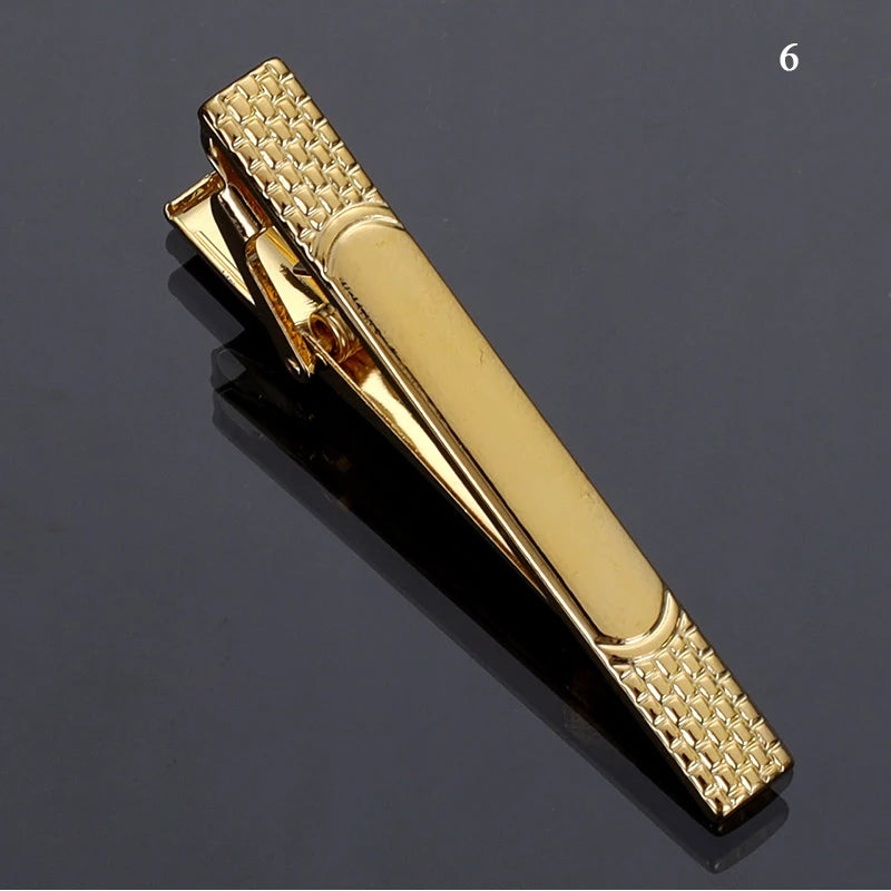 Polished rose gold tie clip, ideal for special occasions.