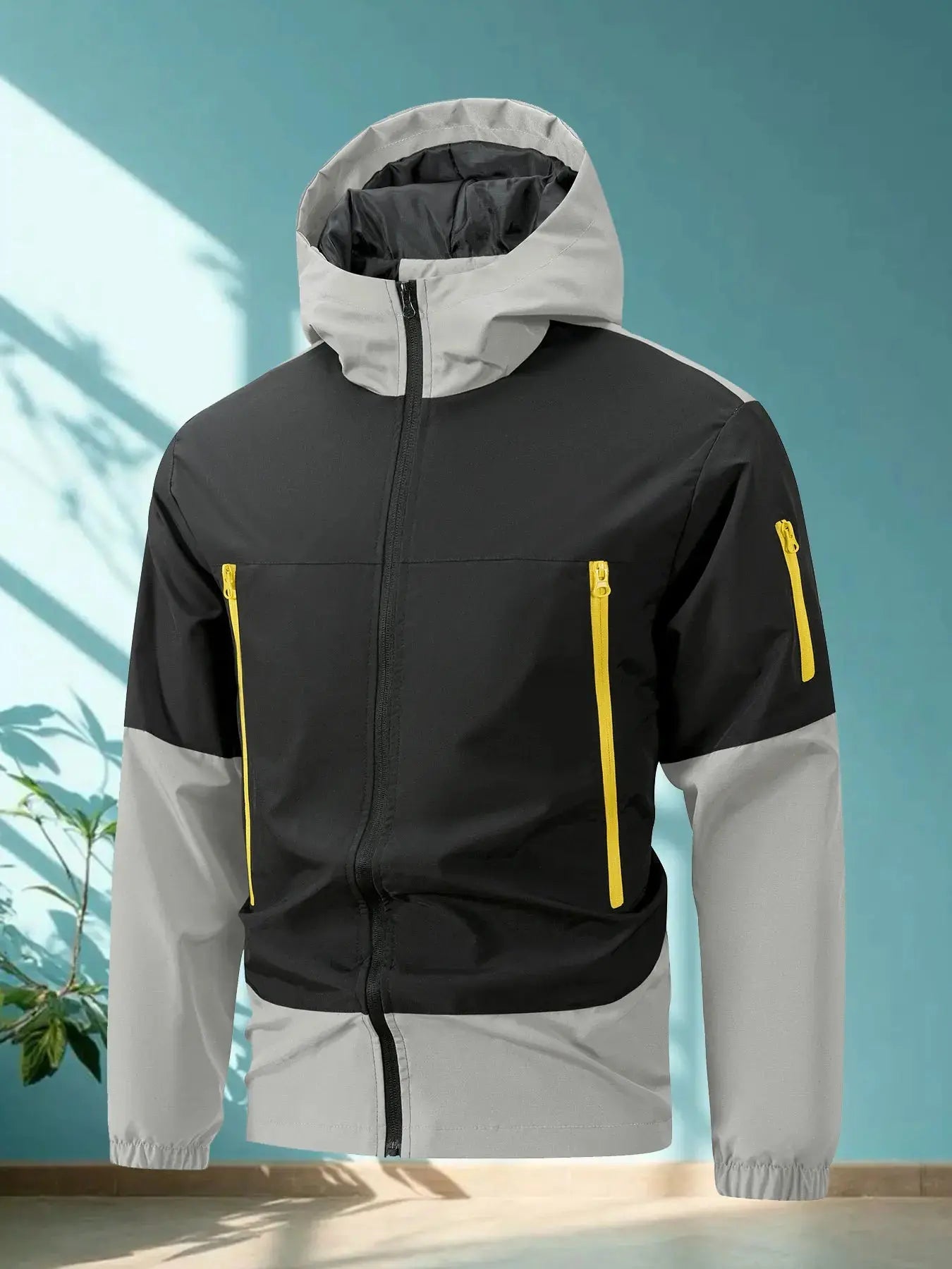 Close-up of the Wind Whisperer jacket's durable zipper closure and stand collar design.