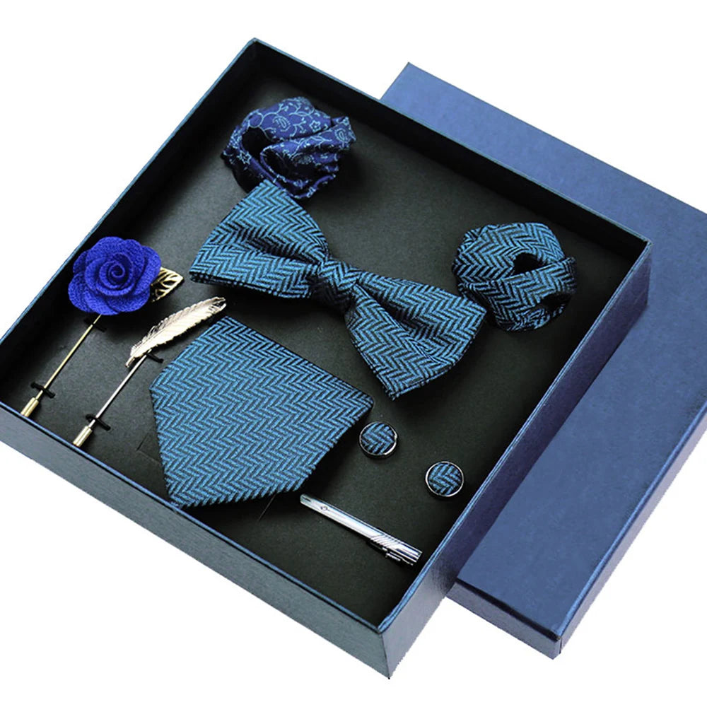 Coordinated formal wear accessories including tie and gleaming cufflinks