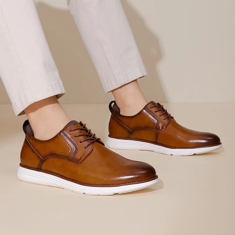 Polished black patent leather dress shoes featuring effortless slip-on mule style and breathable upper