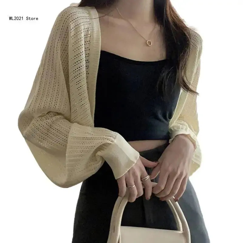 Soft lavender cropped cardigan, designed for effortless elegance and comfort in any occasion.