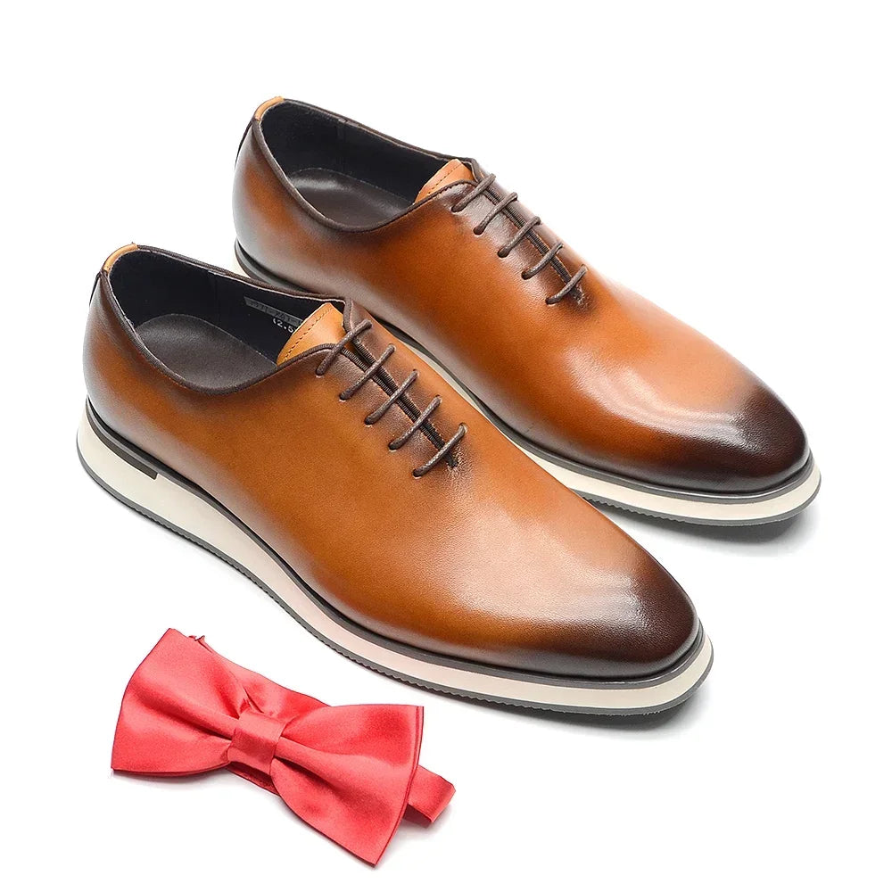 Artisan-crafted black Oxford dress shoes with breathable cowhide upper and genuine sheepskin comfort insole