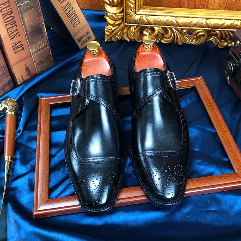 Side view of refined cow suede monk strap shoes featuring decorative buckle and protective toe cap