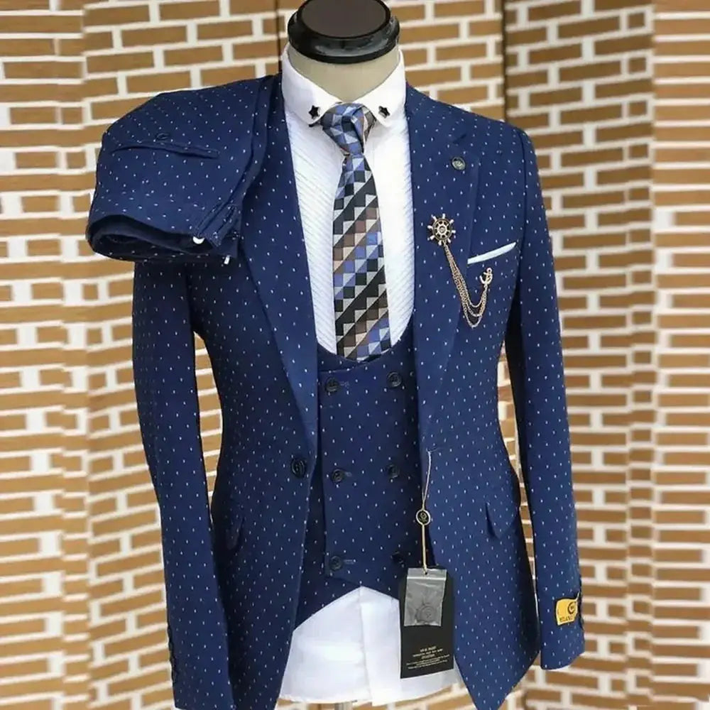 Navy blue three-piece suit with notch lapel, tailored for a slim fit.