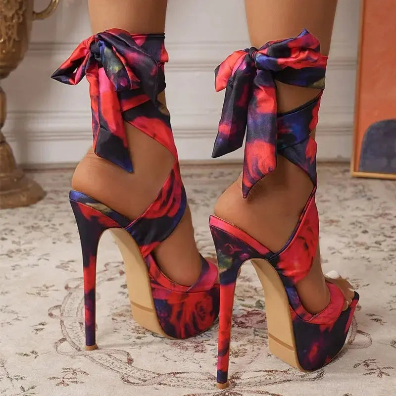 Stylish peep toe pumps in bold red, ideal for evening events and parties.