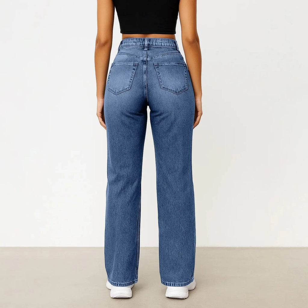 Model wearing high-waisted jeans, highlighting flattering silhouette and wide legs.