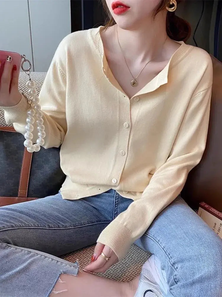Model walking in Cozy Chic Cardigan, illustrating comfort and style in motion.