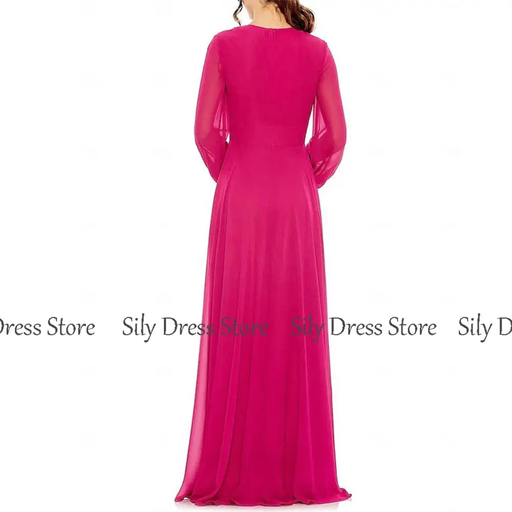 Close-up of ruched detailing on the deep fuchsia chiffon gown, showcasing texture and sophistication.