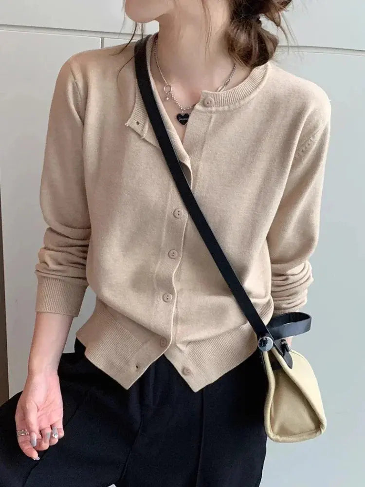 Close-up of Cozy Chic Cardigan's stitching, highlighting its durability and quality craftsmanship.