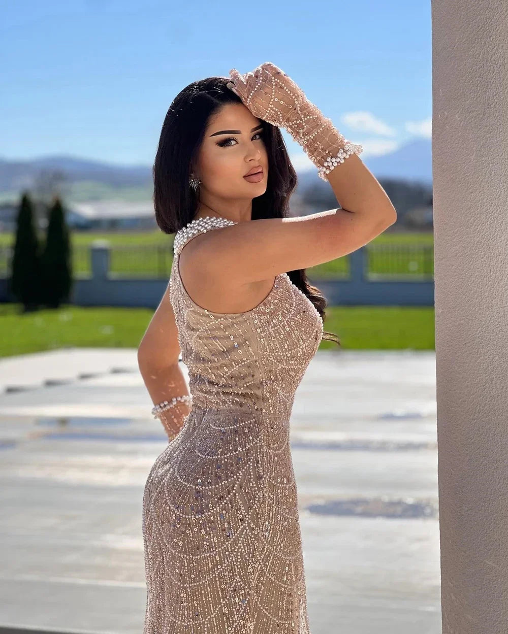 Dazzling mermaid gown in luxurious fabric, perfect for formal events and prom.