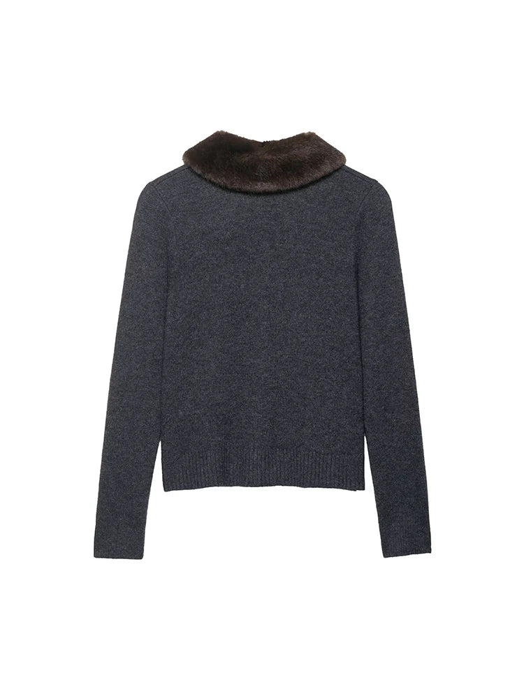 Close-up of the button detail on the Autumn Whisper Cardigan, showcasing its chic design.