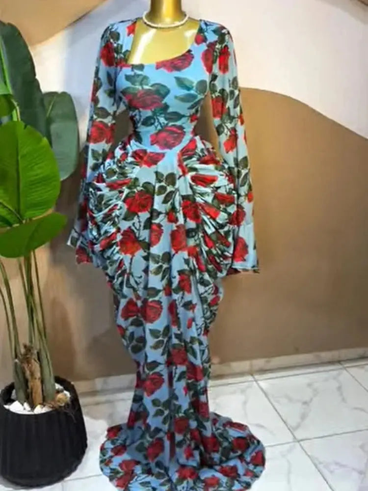 Flat lay of the Floral Whisper Asymmetrical Dress, emphasizing its intricate floral patterns.