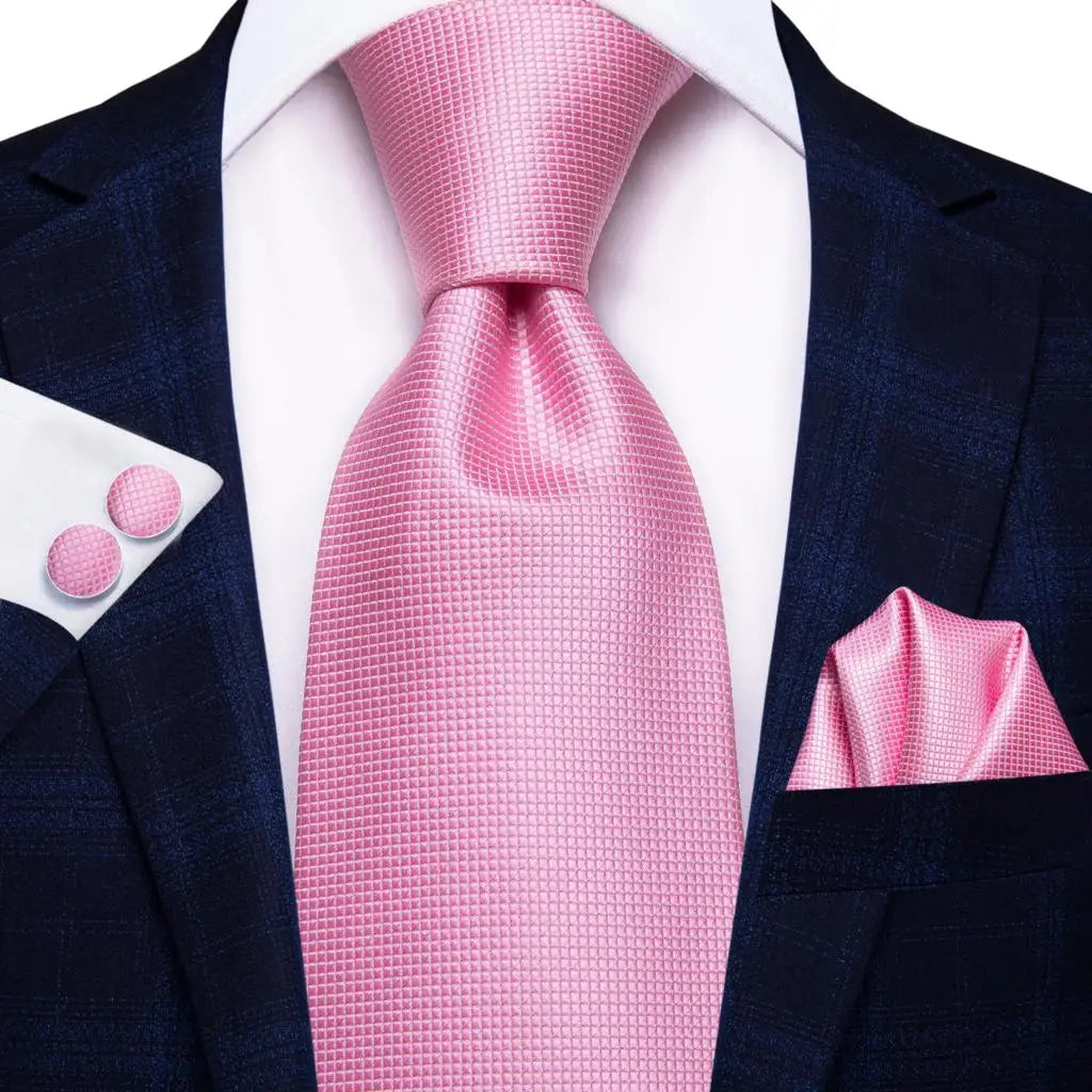 Complete formal tie set including paisley necktie, pocket square, and matching cufflinks for men