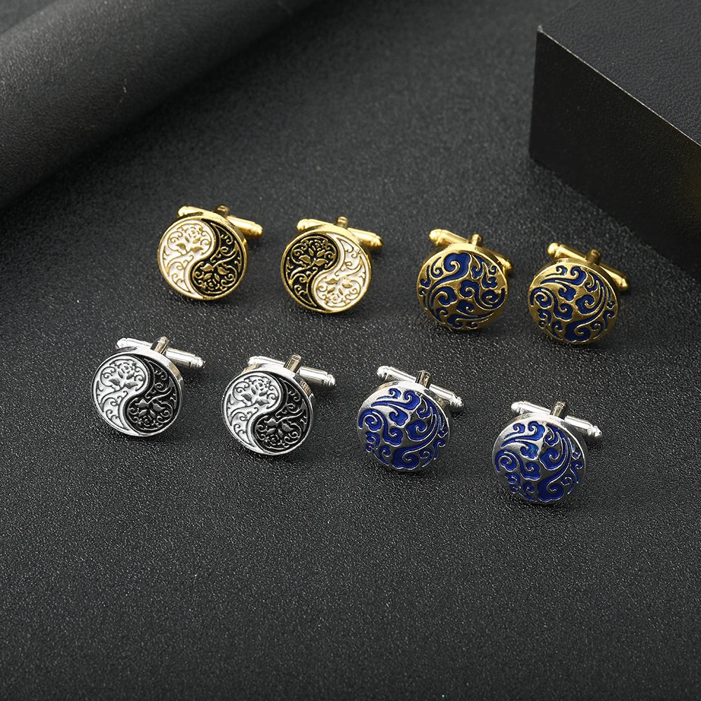 Close-up of Yin Yang cufflinks showcasing intricate Tai Ji engravings.