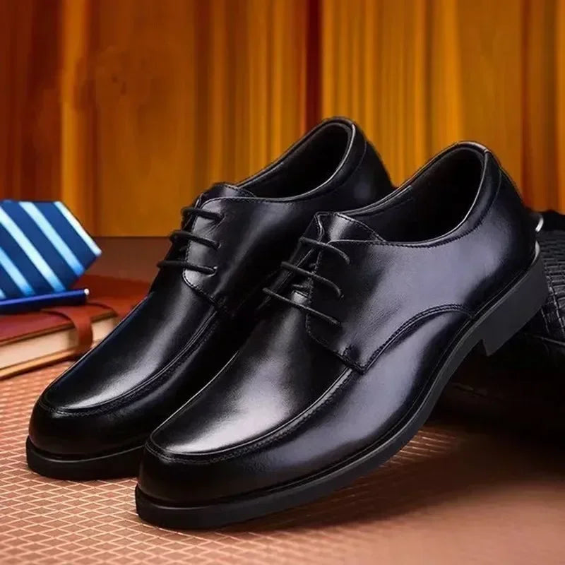 Close-up of cushioned insoles in Italian leather dress shoes, highlighting superior comfort for all-day wear.