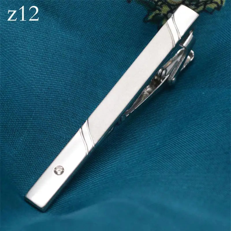 Rose gold tie clip, designed for the discerning gentleman.