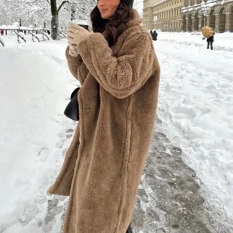 Model wearing the Winter Whisperer coat, highlighting its stylish fit and warm polyester fabric.