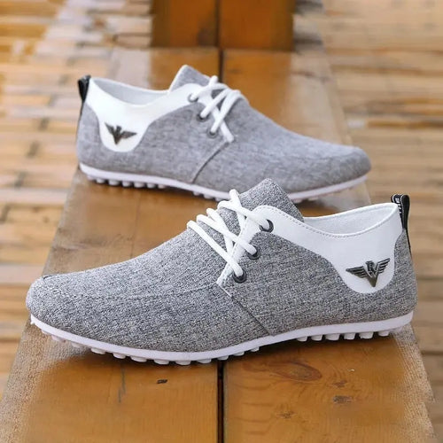 Breathe Easy Canvas Sneakers in navy blue, featuring breathable canvas for comfort.