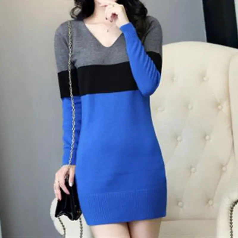 Detail shot of the dress's knit texture, emphasizing warmth and comfort.