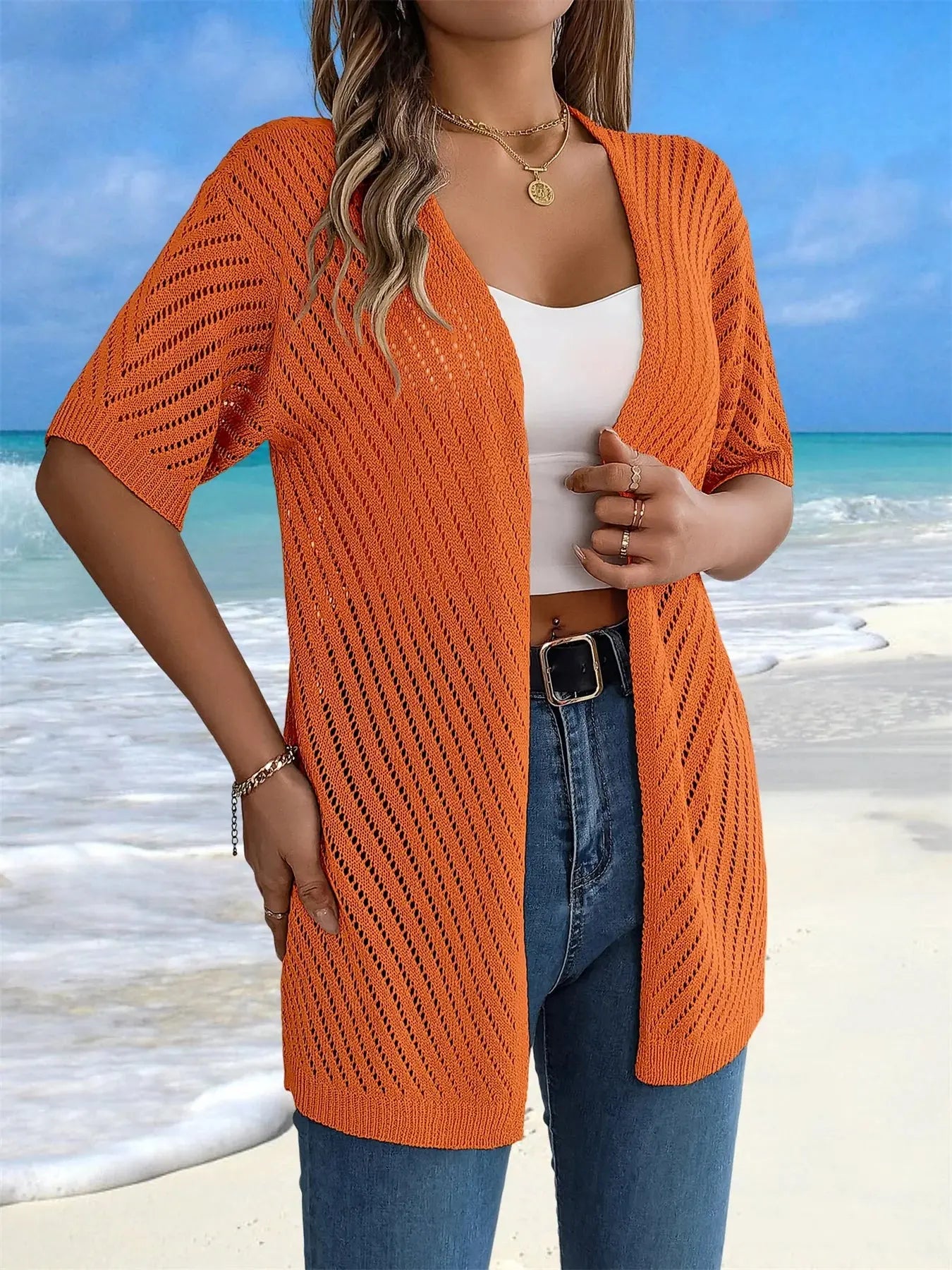 Versatile summer cardigan in airy crochet, perfect for beach cover-ups.