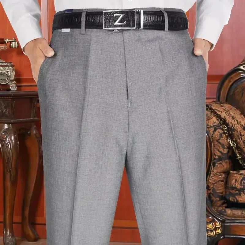Elegant high-waist trousers in dark blue, perfect for modern men's fashion.