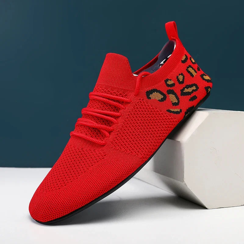 Whisper-Soft Steps sneakers in black dynamic mesh, showcasing breathable upper for urban exploration.