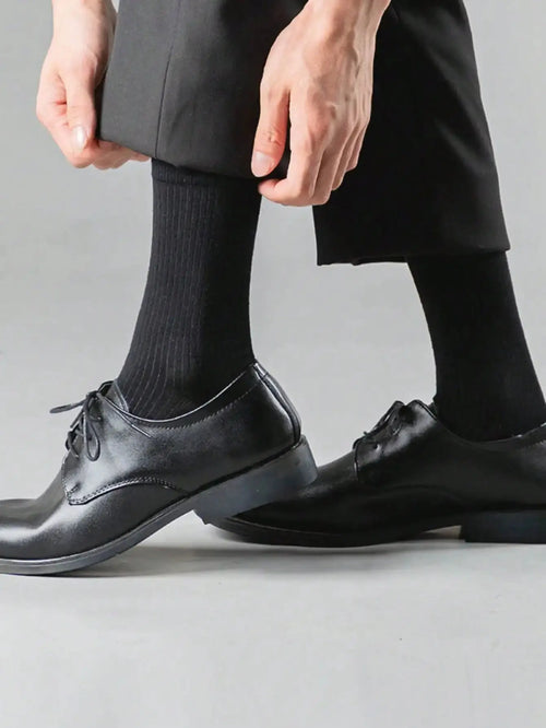 Close-up of resilient dress socks showcasing moisture-wicking technology.