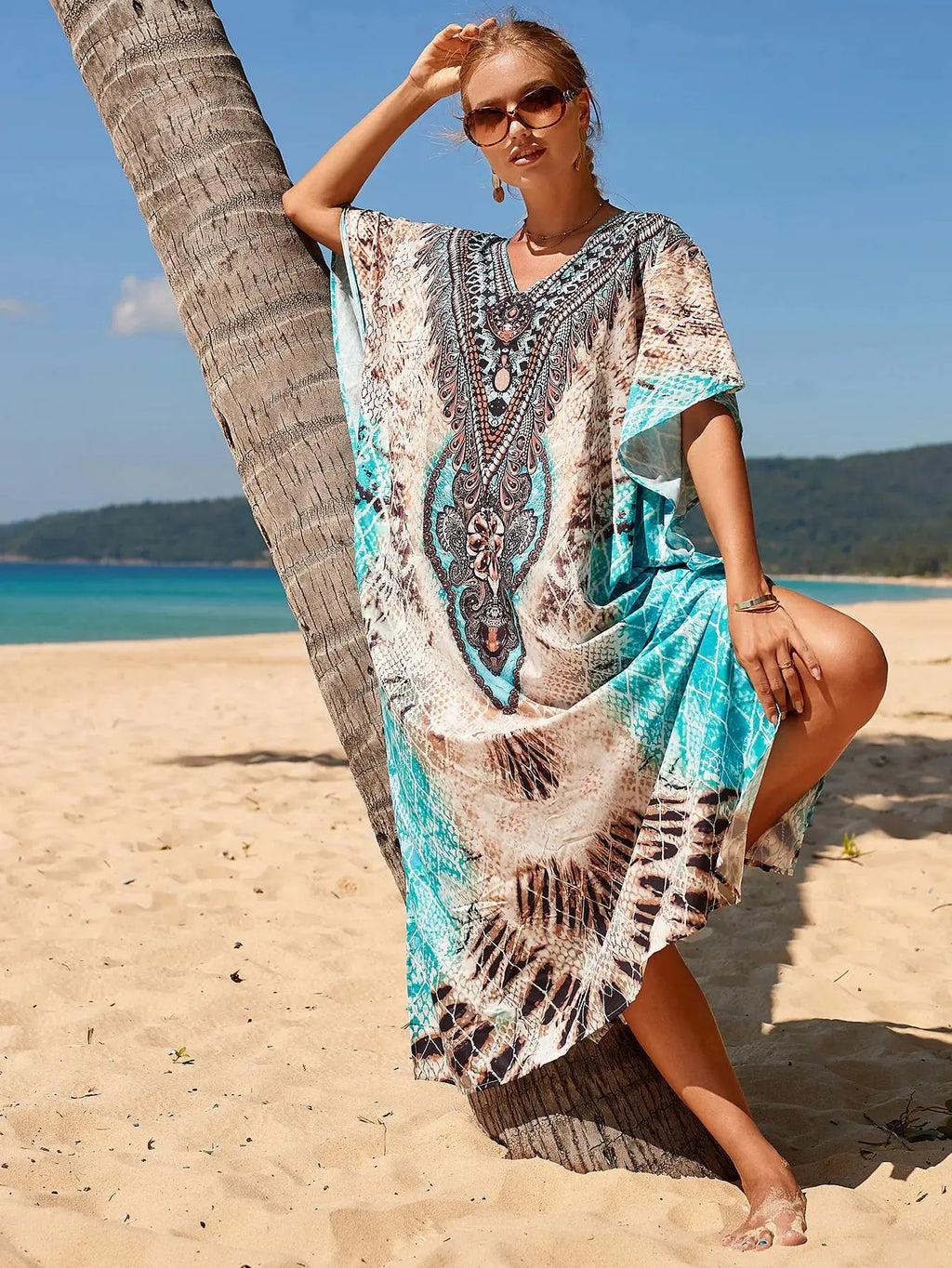 Model wearing the Breeze Whisper Kaftan, showcasing its flowy design and breathable material.