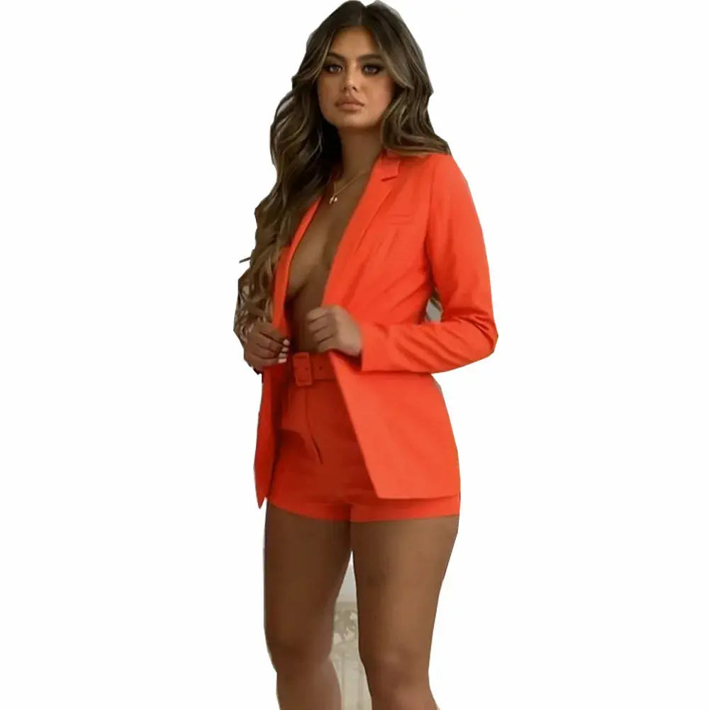 Navy blazer and shorts ensemble, easy-care material for effortless style.