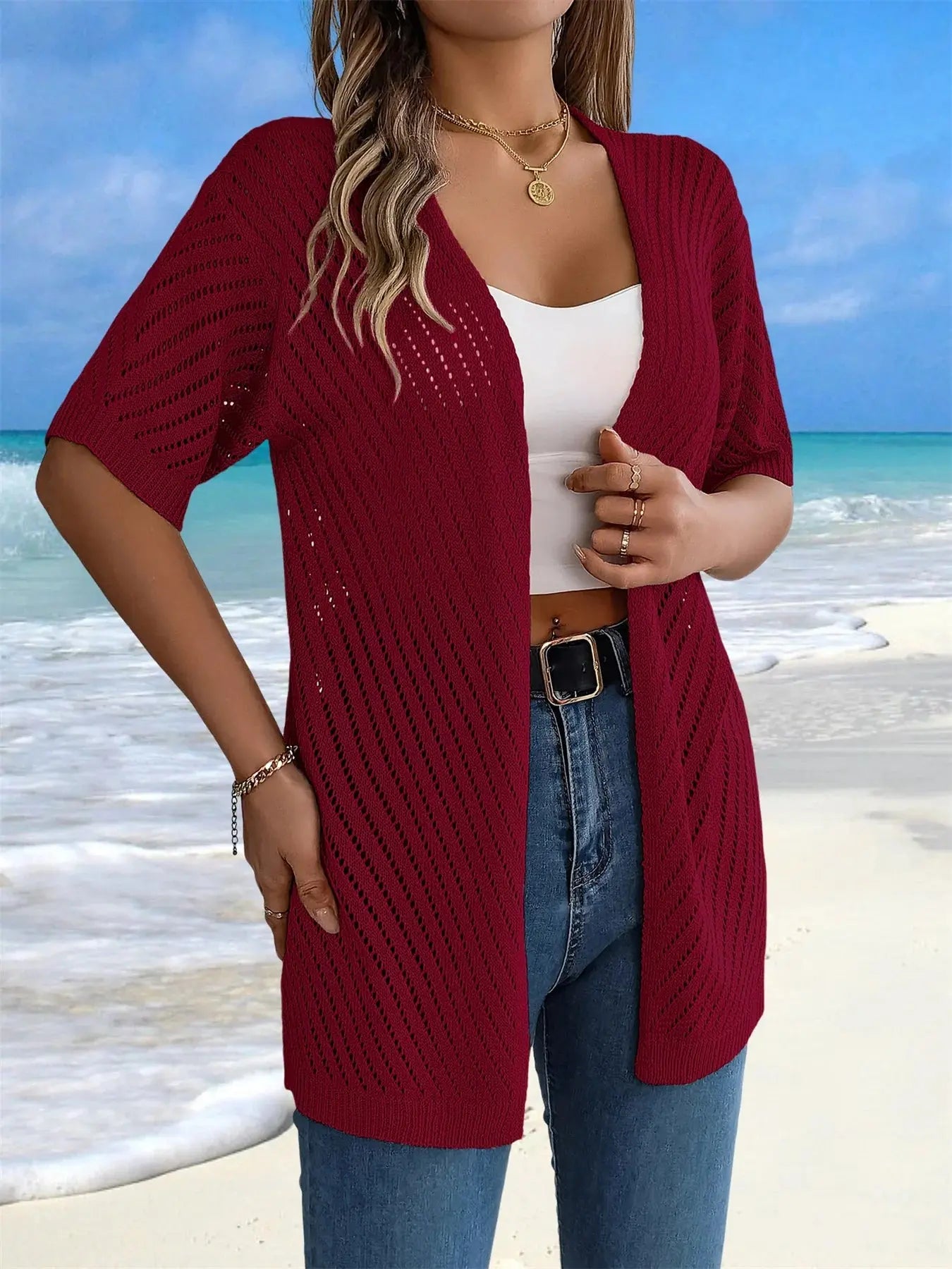Breeze Whisperer Crochet Cardigan paired with a sun dress for a whimsical look.