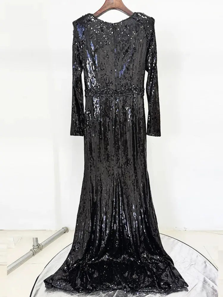 Model wearing the sequined gown, capturing the spotlight at a gala event.