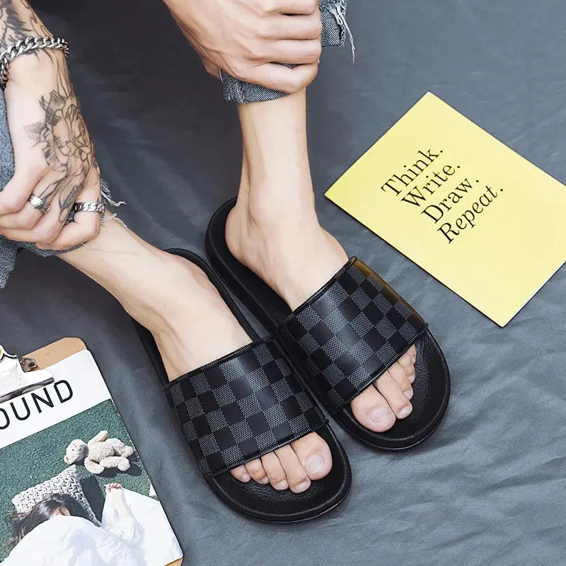 Breeze Through Summer sandals on a sandy beach, ideal for summer adventures.