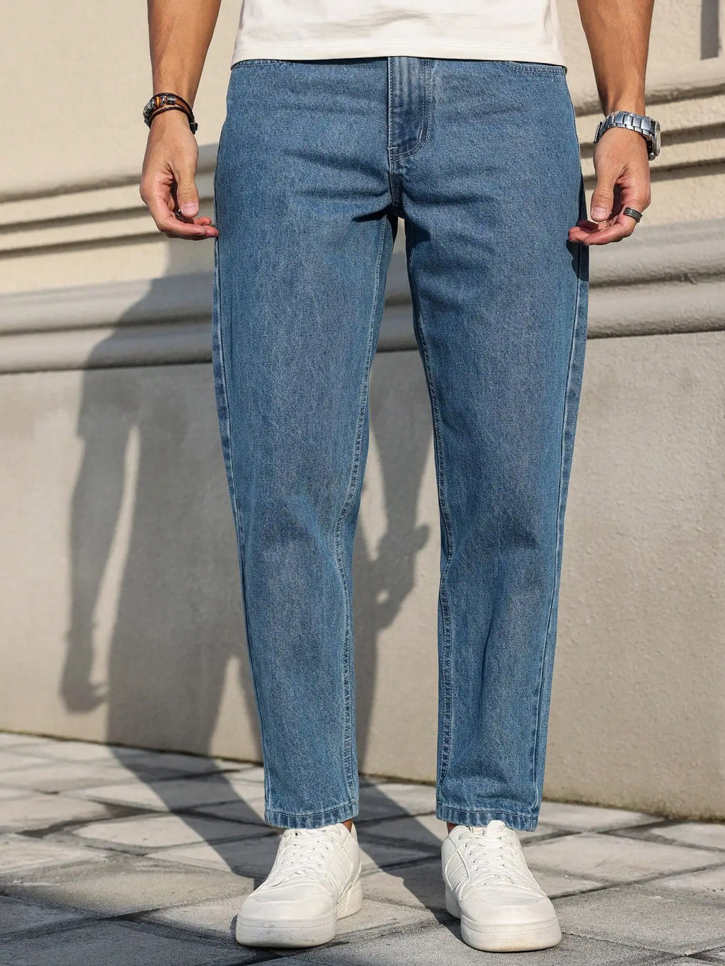 Blue denim jeans with a loose fit for comfort and style.