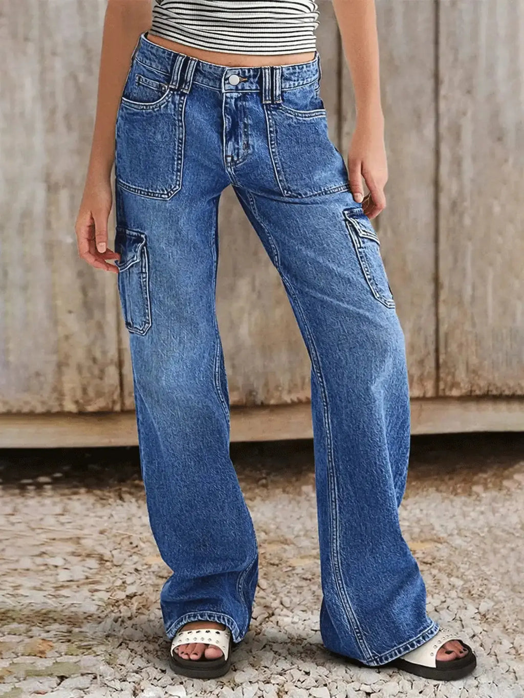 Model wearing City Stride jeans, highlighting practical pockets and a flattering fit for busy lifestyles.