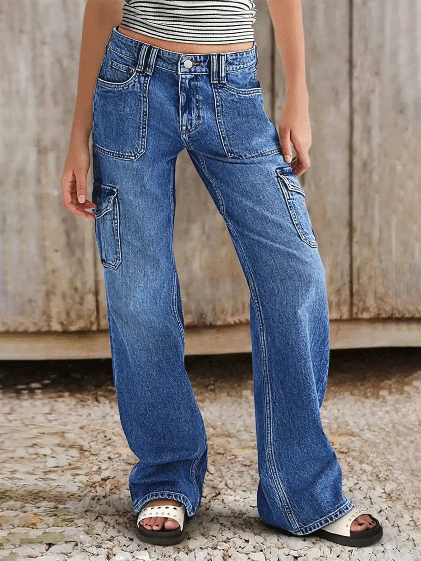 Model wearing City Stride jeans, highlighting practical pockets and a flattering fit for busy lifestyles.