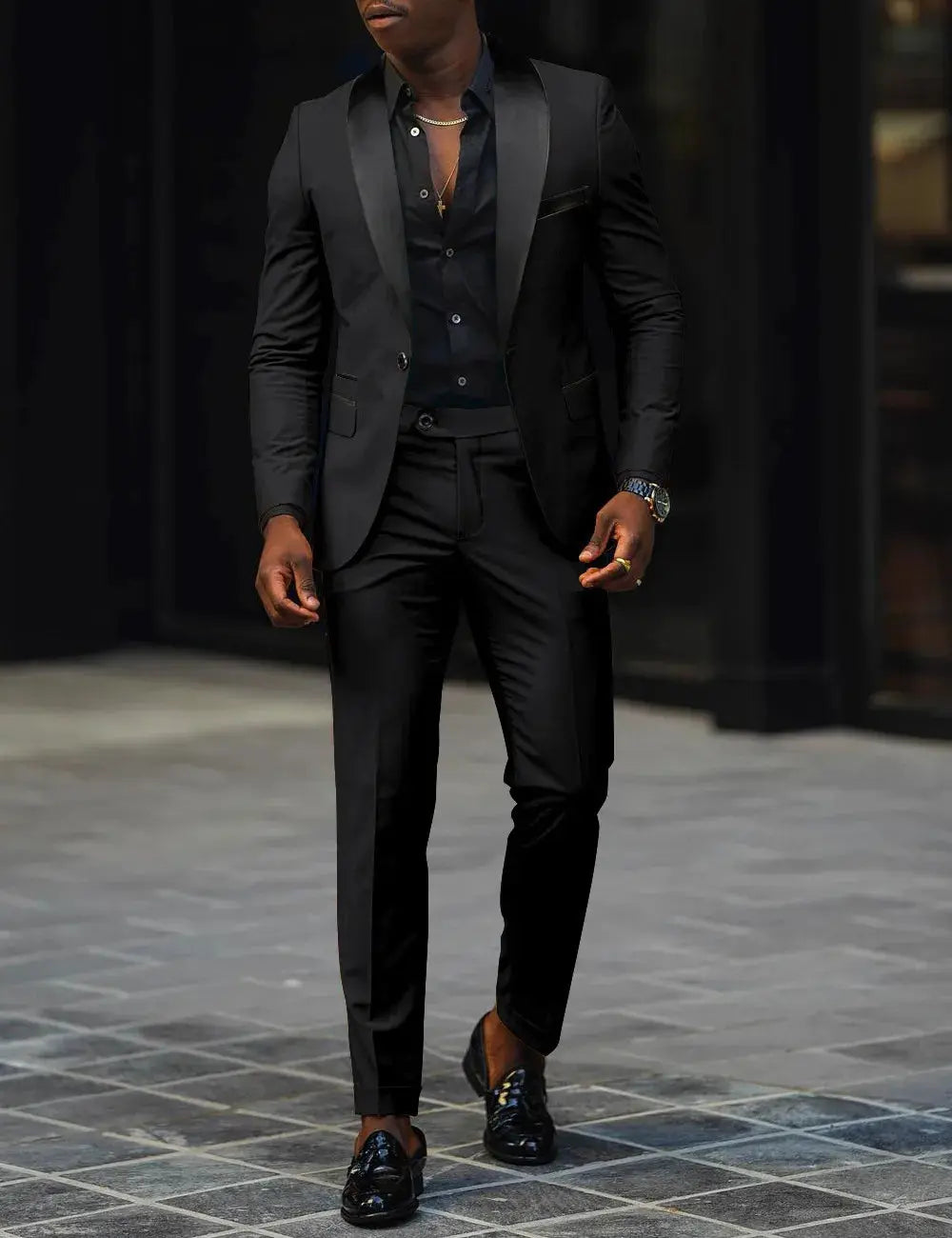 Model confidently presenting in a sleek suit, embodying professionalism.