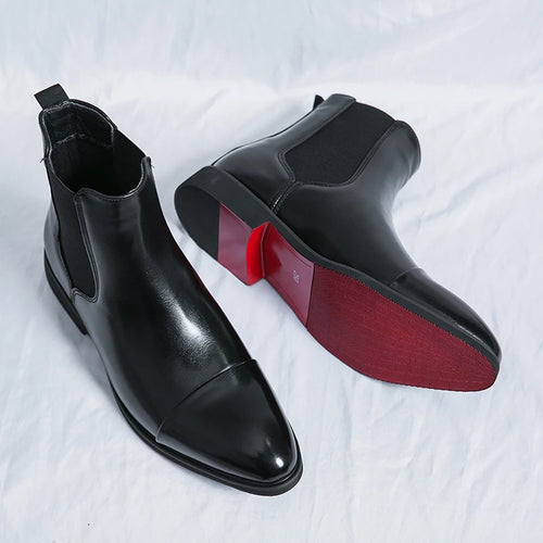 Black waterproof slip-on ankle boots with elastic side panels on white background