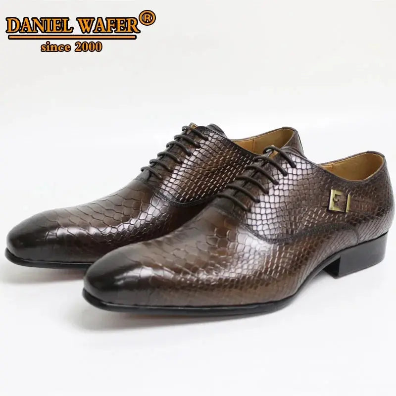Elegant coffee and black pointed toe oxfords on a wooden surface.