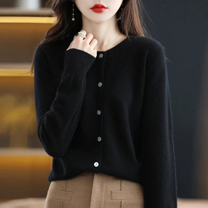 Model wearing the Autumn Whisper Cardigan during a casual evening outing.
