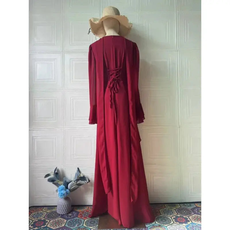 Detail shot of the refined material of the Abaya, ideal for festival clothing.