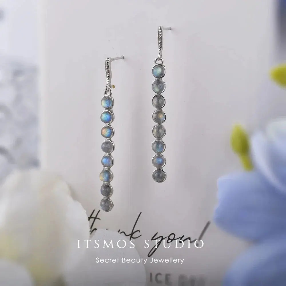 Celestial Glow Labradorite Silver Earrings showcasing vibrant labradorite stones and elegant silver design.