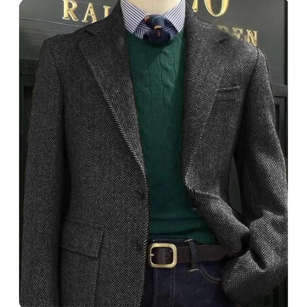 Single-breasted blazer in classic herringbone, ideal for layering in crisp autumn weather.