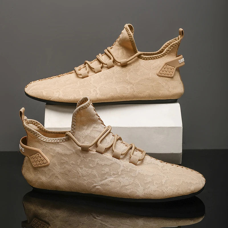 Close-up of tan loafers highlighting the ultra-light EVA outsole.